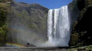 Ijsland waterval Skogafoss [upl. by Novonod]