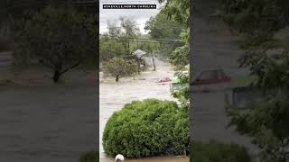 House floats through flooded streets in Asheville North Carolina after Hurricane Helene [upl. by Serafina]