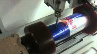 Gravograph M40 engraving a Red Bull Energy drink Aluminum can [upl. by Deehsar613]