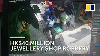 Surveillance video of Hong Kong jewellery shop robbery [upl. by Nohsram]