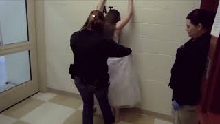 Girl searched at police station procedure including feet pat down [upl. by Onilecram]