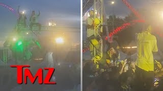 Travis Scott Stops Concert and Orders Fans Dangling from Truss to Get Down  TMZ [upl. by Dallas413]