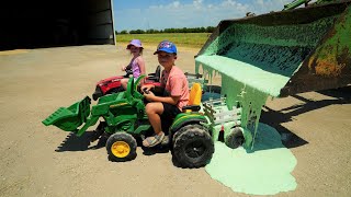 Dumping slime into kids tractors  Tractors for kids [upl. by Esenaj286]