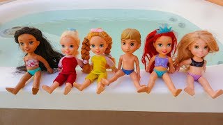 Elsa and Anna toddlers pool party and challenges [upl. by Lusar]