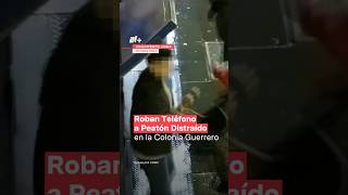 Roban teléfono a peatón distraído en la colonía Guerrero  N shorts [upl. by Nnahtebazile]