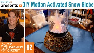 DIY Motion Activated Snow Globe  The Learning Circuit [upl. by Lek]