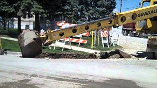 Landmark Contracters Gradall XL4100 digging for curb to be replaced [upl. by Wieren97]