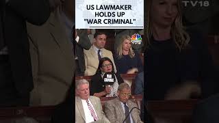 Viral Moment US Rep Rashida Tlaib Holds War Criminal Sign as Netanyahu Speaks  US House  N18G [upl. by Sheepshanks]