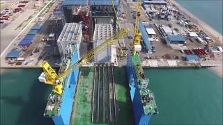 Slipforming with Gantry Fabrication and transfer of caissons [upl. by Ylrae390]