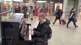 The most Insane Interstellar cover on a train station public piano [upl. by Tillo]