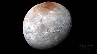 Did Pluto’s Moon Charon Get Smacked Upside Its Head  Video [upl. by Leira265]