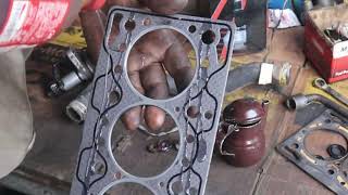 How To Replace Suzuki Cylinder Head Gasket [upl. by Bithia]