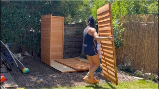 Building wooden garden shed woman time lapse [upl. by Lotsyrc]