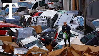 Valencia flood Drone footage reveals car graveyard as Spain announces new aid measures [upl. by Boynton]