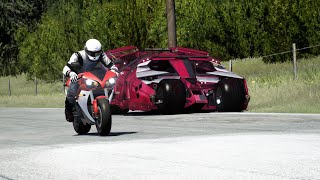 Batmobile Tumbler  Batman Begins 2005  vs Yamaha YZFR1 at Old SPA [upl. by Laumas644]