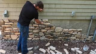 How to stone veneer a wall [upl. by Orelu]