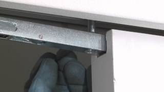 Installing the door on an Eclisse Syntesis Line pocket door system [upl. by Queston]