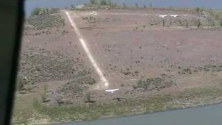 Owyhee Pelican Point Airstrip landing cockpit perspective 01 [upl. by Yelahs277]