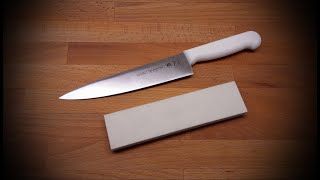 Sharpening Tramontina Professional kitchen knife with Missarka 500 aluminium oxide  corundum stone [upl. by Folly]