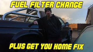 Changing the fuel filter on a Mitsubishi L200 K74  Get you home fix [upl. by Oicirbaf375]