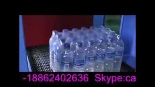 Mineral water packaging machine Mineral water press Sleeve shrink packing machine [upl. by Mariejeanne]