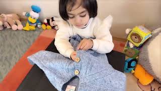 Preschool Life Skills Unbuttoning and Buttoning a Shirt  Montessori Practical Life Lesson [upl. by Enneira]