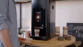 FreshGround 310 Touch  Fully automatic vending machine for coffee specialties [upl. by Esiled]