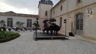 SaintEstèphe les dernières secondes du concert de Gautier Capuçon sous la pluie [upl. by Enirrok]