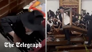 Riot breaks out in New York City synagogue over secret tunnel [upl. by Sims]