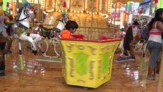 Crazy Kid Almost Falls Out Of Carousel At Albrook Mall in Panama [upl. by Ahsienauq940]