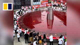 Hundreds of diners in China enjoy ‘world’s largest spicy hotpot’ [upl. by Ynohtnacram]