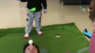 Kid hits father in the face with golf stickViral Funny video [upl. by Julia413]