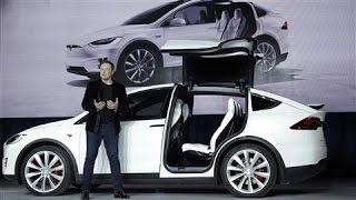 Tesla Launches Model X Electric SUV [upl. by Ynohta]