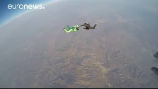 Skydiver Luke Aikins makes parachutefree jump from from 76km 25000ft [upl. by Etana]