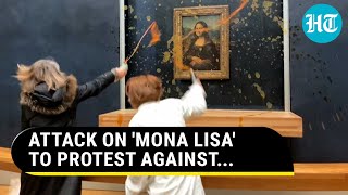 Mona Lisa Defaced In Paris Attack On Painting To Protest Against  Watch [upl. by Anyek]