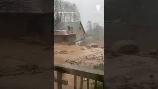 Mudslide triggered by Helene sweeps through North Carolina yard [upl. by Lefty]