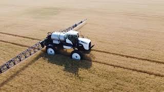 AGCO Willmar 8600 Eagle with 120’ John Deere boom desiccating wheat [upl. by Ilsel]