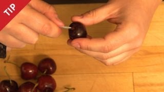 How to Pit a Cherry with a Paper Clip  CHOW Tip [upl. by Aderb765]