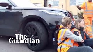 Footage shows moment Insulate Britain protester was pushed by wheels of car [upl. by Sweatt]