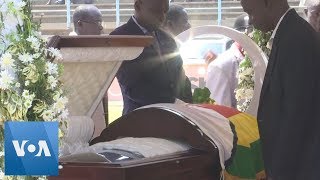 Mourners Pay Respects to Mugabe at Zimbabwe Stadium [upl. by Yanehc]