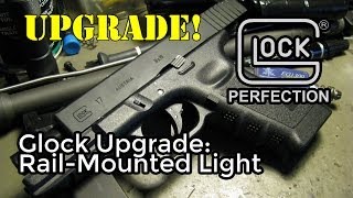 Installing a RailMounted Tactical Light on a Glock [upl. by Imogene]