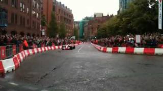 Jenson Button donuts F1 car in Albert Square Manchester [upl. by Freeman]