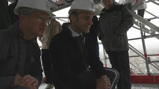 Macron visite le chantier de NotreDame de Paris à un an de la réouverture  AFP Images [upl. by Ellinnet]