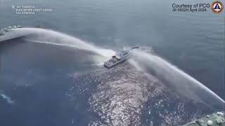 Philippine Ship Blasted With Water Cannon by Chinese Coast Guard [upl. by Romy]