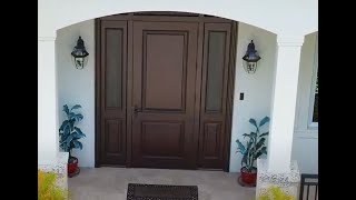 Custom Hurricane Wood Doors made by wwwcustomdoorscom Door Design CLICHY customdoors Miami [upl. by Aitercul]