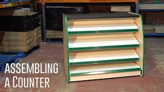 How to assemble a Shop Counter  assembly step by step video guide  Shelving4shops [upl. by Aihcropal629]