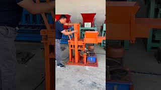 interlocking paving block machine9 inches brick making machine [upl. by Goodhen]