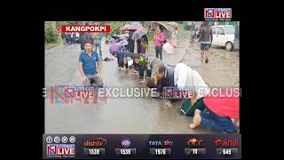 Manipur Unrest Menwomen kneel in prayers along NH2 seeking peace [upl. by Anhavas124]