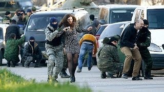 Russian forces storm Ukraines Crimea bases [upl. by Ydderf638]