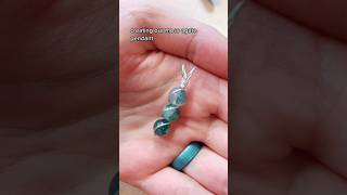 How to make a wire wrapped pendant using beads [upl. by Eerrehc]